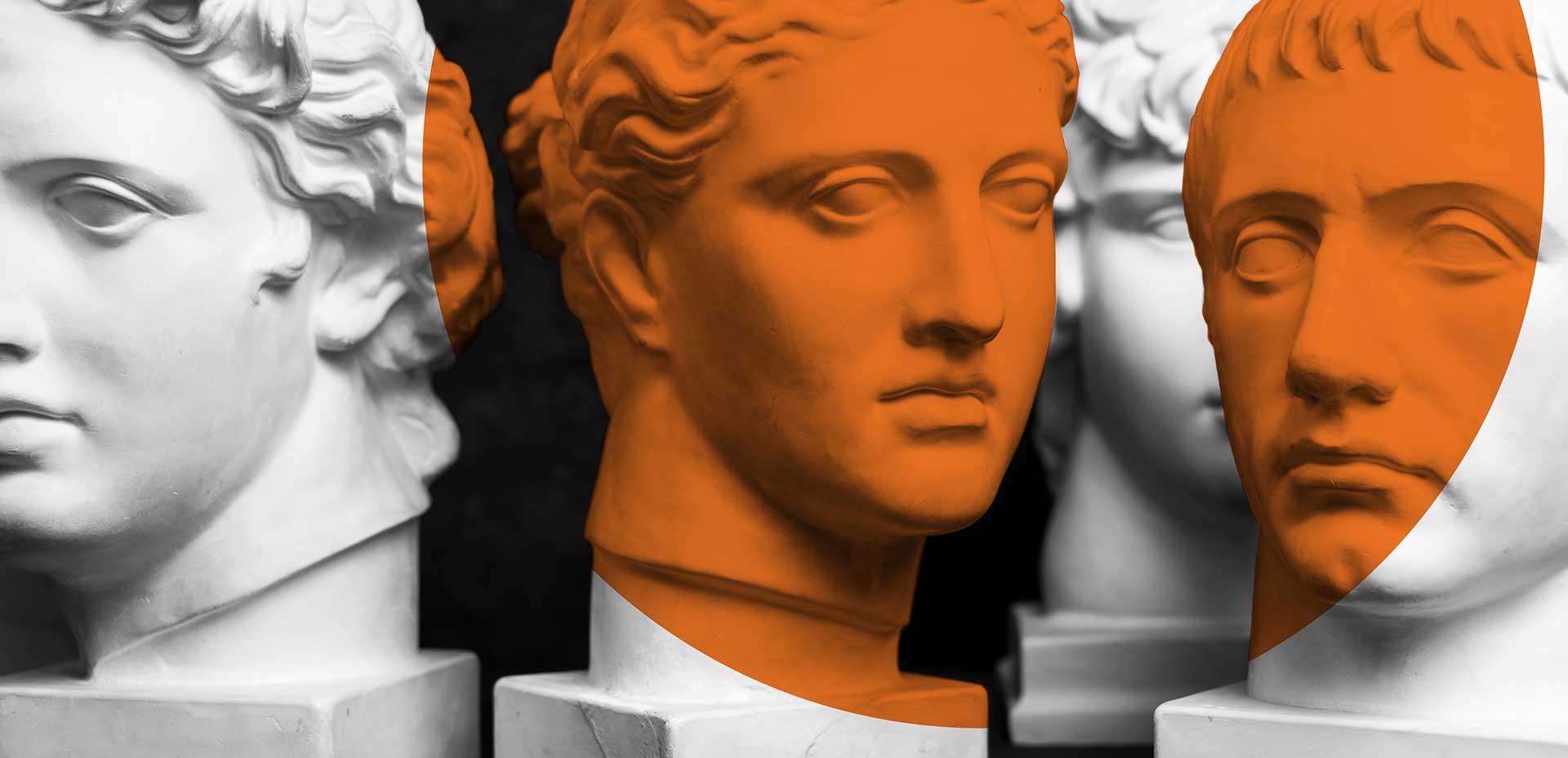 Close-ups of statue faces symbolizing philosophy.