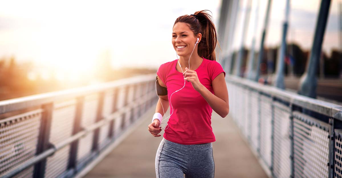 Lady running outdoors for good exercise.